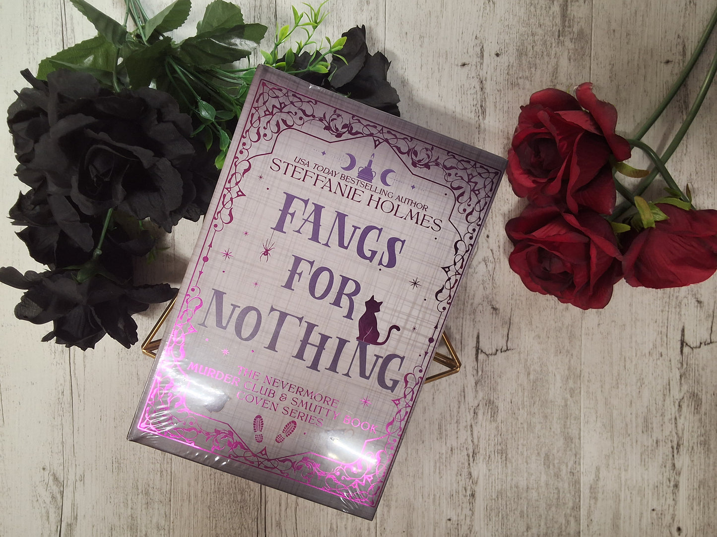 Fangs for Nothing (The Nevermore Murder Club and Smutty Book Coven 1)